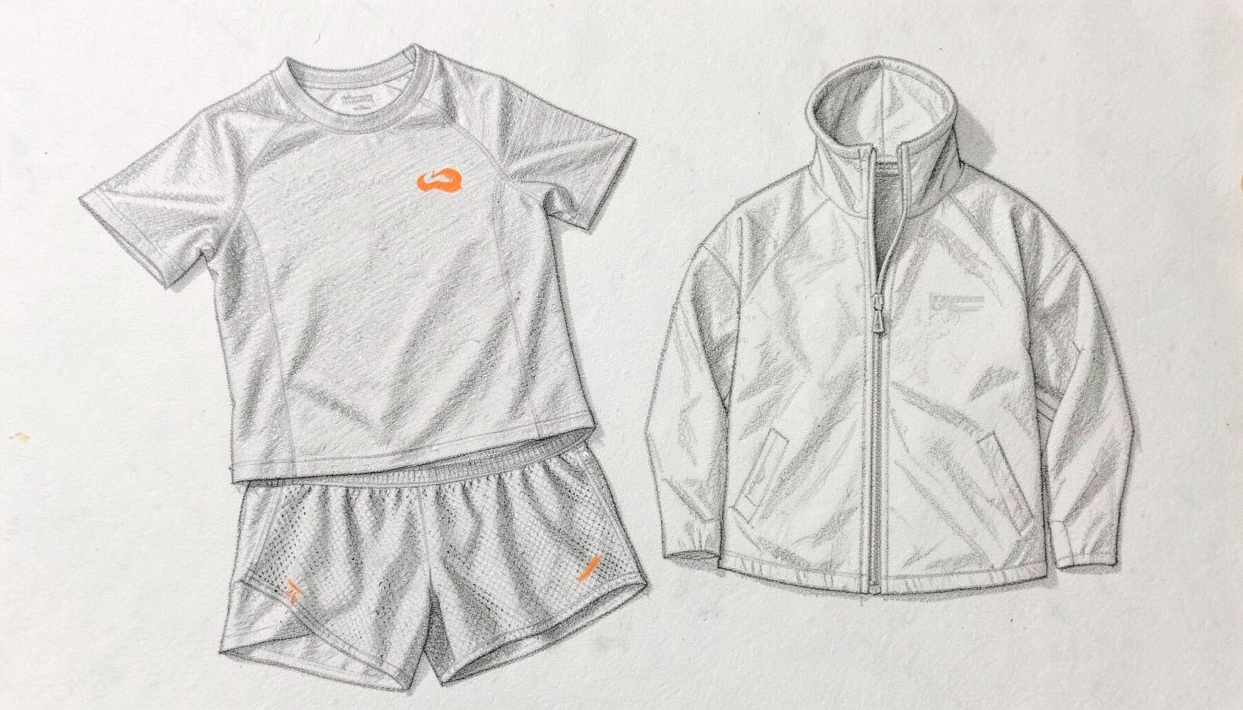 Graphite pencil sketch of men's athletic apparel laid flat — a short-sleeve performance shirt, mesh shorts, and a lightweight training jacket, rendered in soft gray tones with subtle crosshatch shading against a pale background.